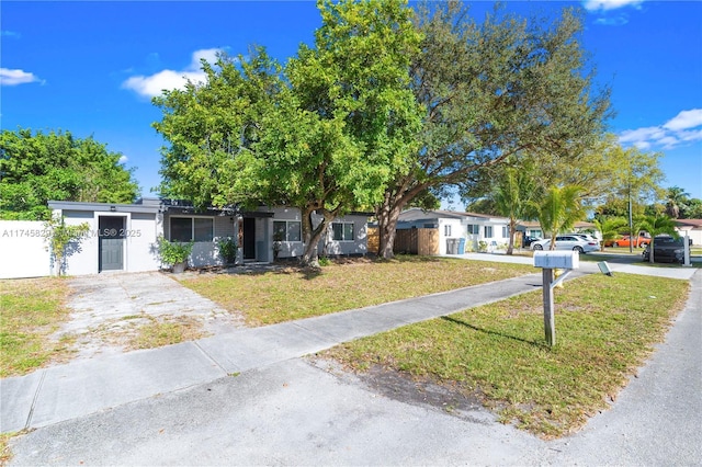 view of front of home with a front yard