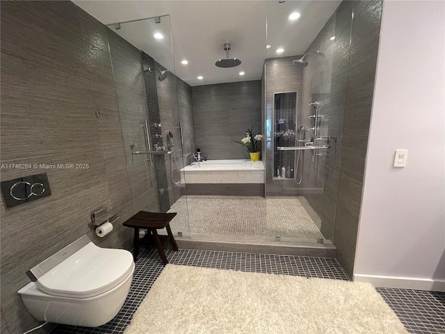 bathroom featuring tile patterned flooring, tile walls, toilet, and tiled shower