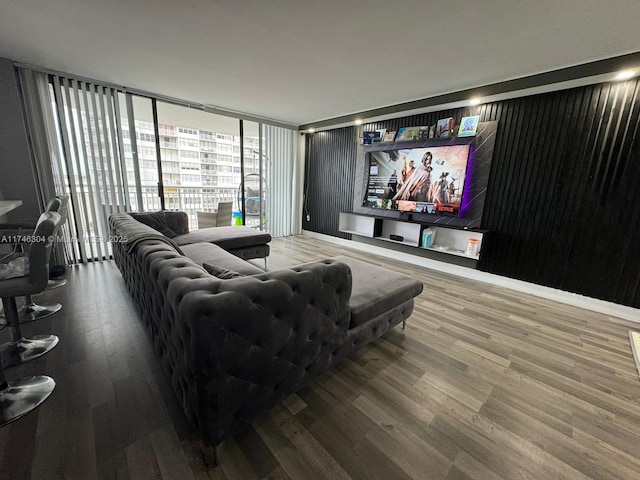 cinema room featuring hardwood / wood-style floors