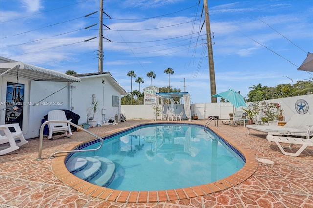881 SW 137th Ct, Miami, FL 33184 - view of swimming pool featuring a fenced in pool, a patio area, and a fenced backyard