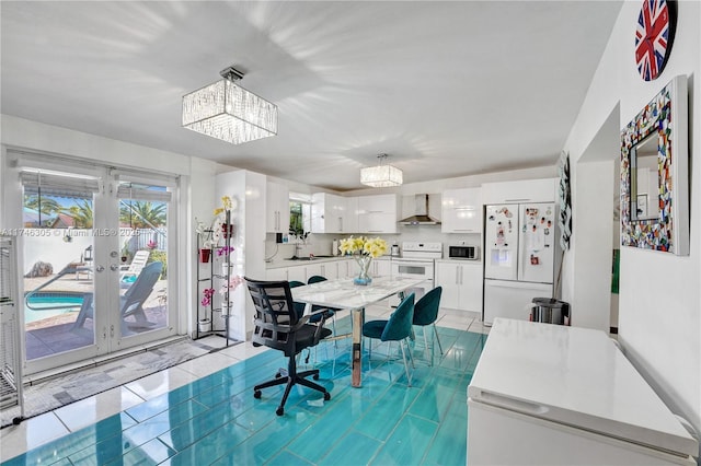 881 SW 137th Ct, Miami, FL 33184 - dining space featuring french doors, light tile patterned flooring, and a notable chandelier