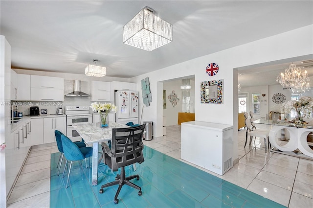881 SW 137th Ct, Miami, FL 33184 - dining room featuring washer and dryer, light tile patterned flooring, and an inviting chandelier
