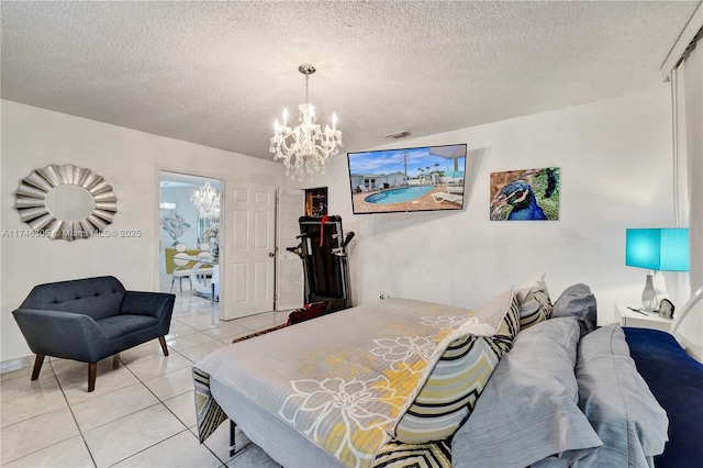 881 SW 137th Ct, Miami, FL 33184 - bedroom featuring a notable chandelier, a textured ceiling, and light tile patterned floors