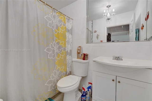 881 SW 137th Ct, Miami, FL 33184 - bathroom with toilet, a notable chandelier, vanity, tile walls, and a shower with curtain