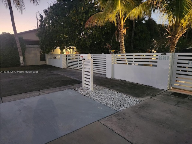 881 SW 137th Ct, Miami, FL 33184 - view of gate featuring a fenced front yard