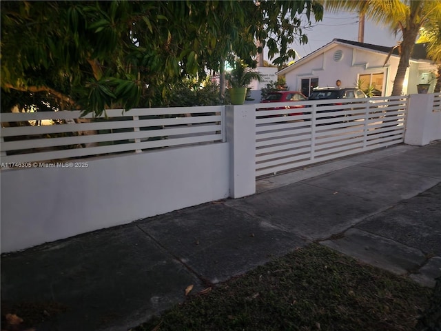 881 SW 137th Ct, Miami, FL 33184 - view of gate featuring a fenced front yard