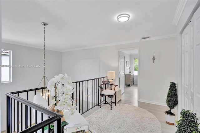 1826 Capeside Cir, Wellington, FL 33414 - corridor featuring an upstairs landing, ornamental molding, wood finished floors, and baseboards