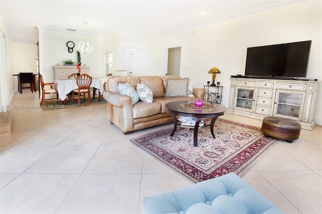 living room with ornamental molding and light tile patterned floors