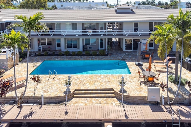 view of pool featuring a patio area