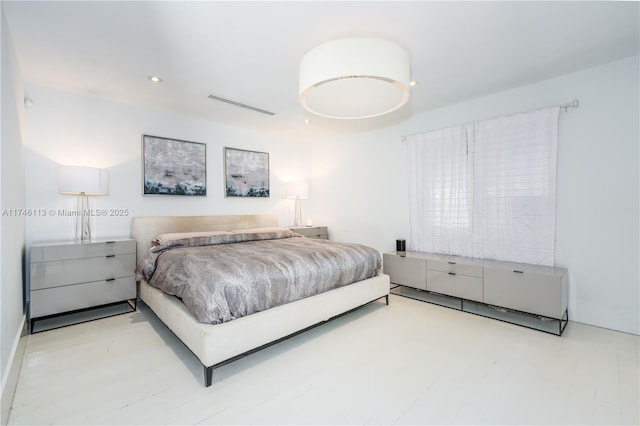 bedroom with recessed lighting