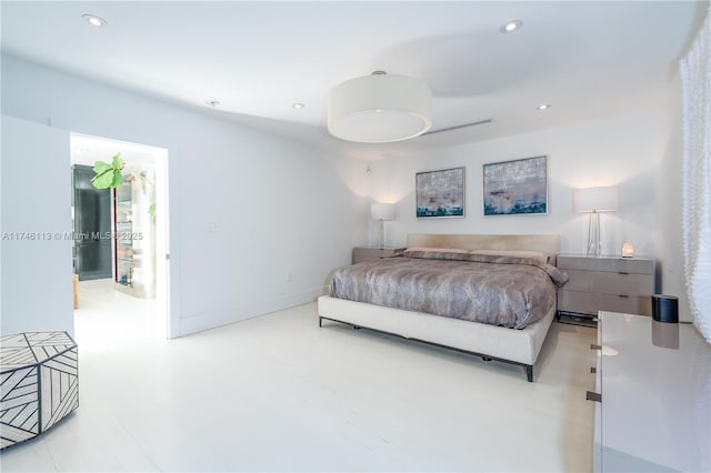 bedroom featuring baseboards and recessed lighting