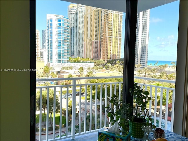 balcony featuring a water view