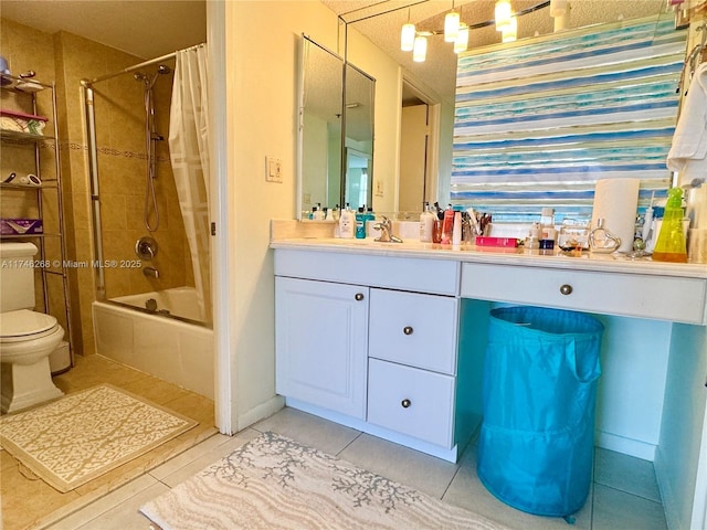 full bathroom featuring shower / bath combination with curtain, tile patterned floors, toilet, and vanity