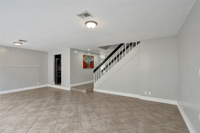 view of tiled spare room