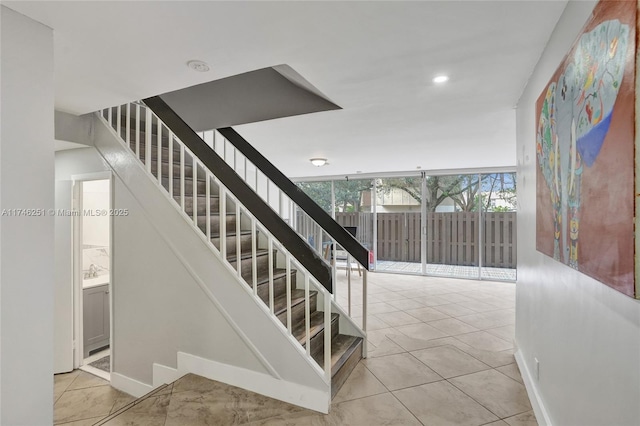 staircase with tile patterned flooring