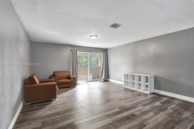 unfurnished room featuring dark hardwood / wood-style flooring