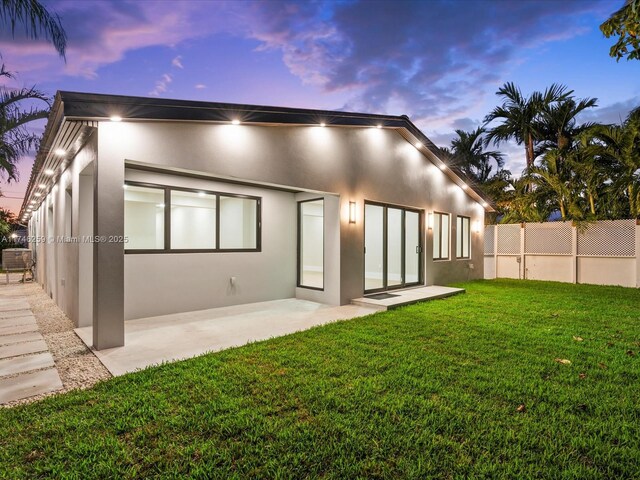 view of yard featuring a fenced backyard and a patio