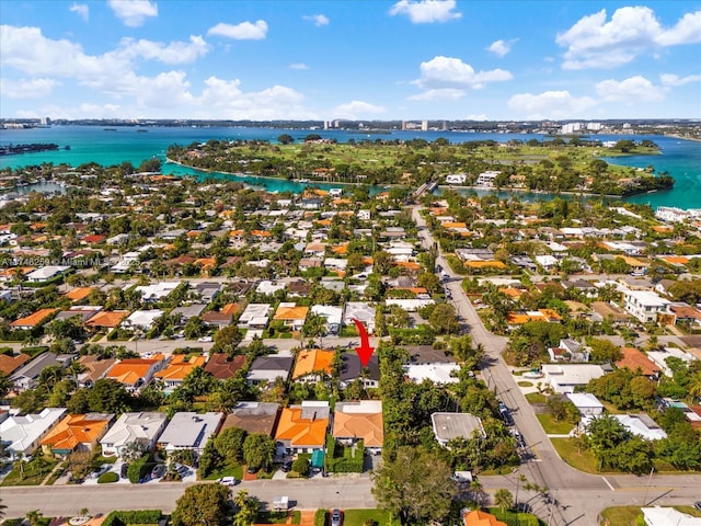 bird's eye view featuring a residential view and a water view