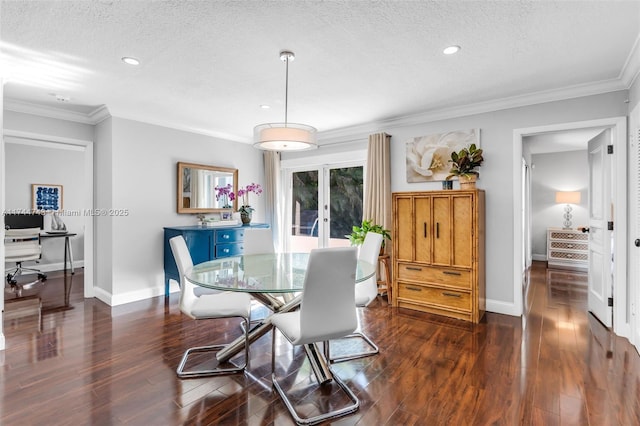 dining area with ornamental molding, french doors, and dark wood-style flooring