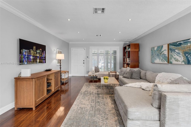 living room with baseboards, visible vents, dark wood-style flooring, and ornamental molding