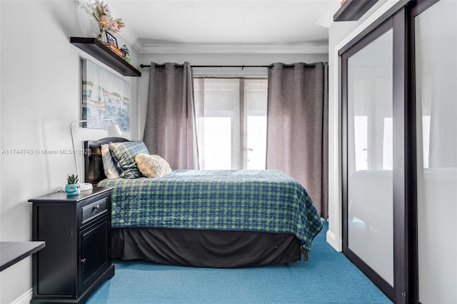 carpeted bedroom with baseboards and crown molding