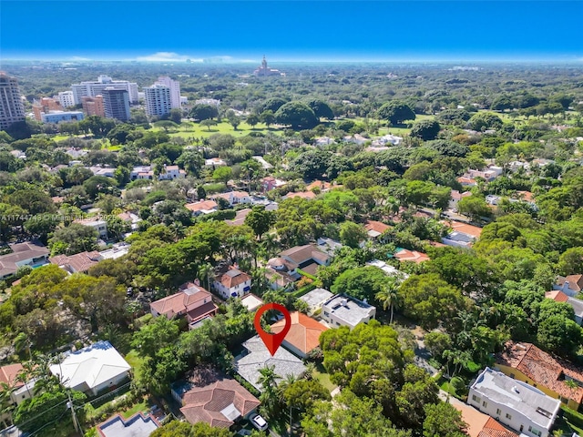 birds eye view of property with a residential view