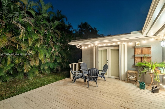 view of deck at night