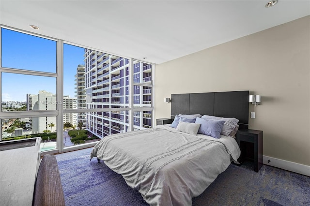 bedroom featuring expansive windows