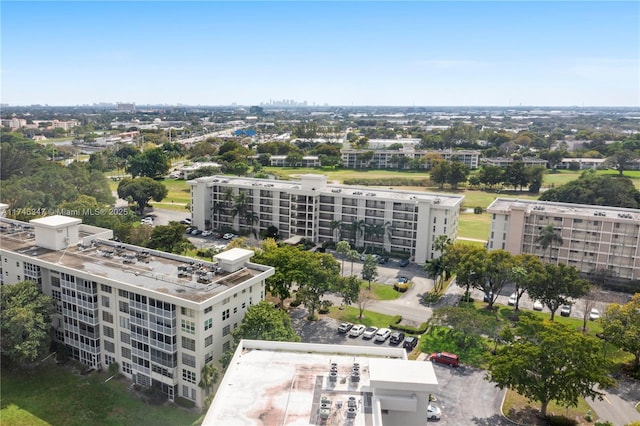 birds eye view of property with a view of city