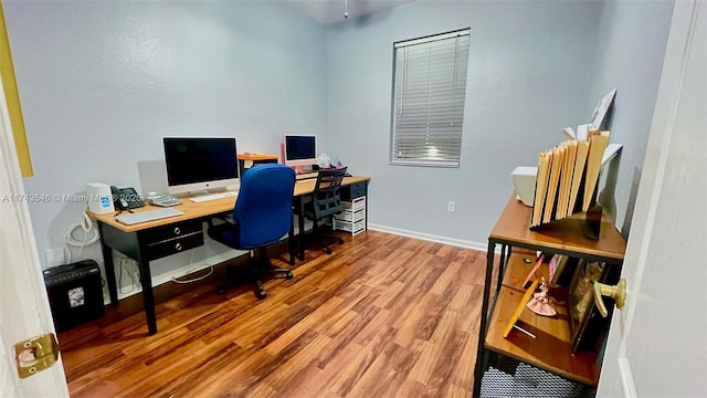 office featuring wood finished floors and baseboards