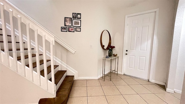 3772 NE 9th Ct, Homestead, FL 33033 - foyer featuring stairs and light tile patterned floors