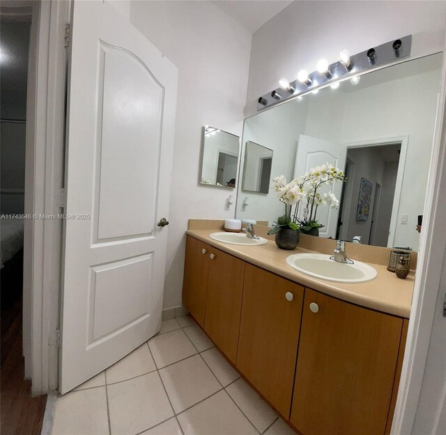 3772 NE 9th Ct, Homestead, FL 33033 - full bath with double vanity and tile patterned flooring