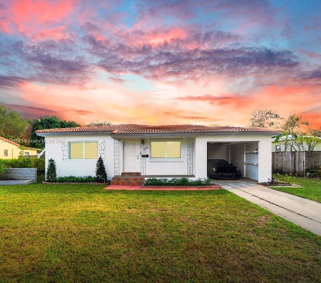 view of front of home with a lawn