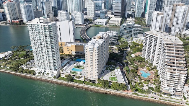 birds eye view of property featuring a water view