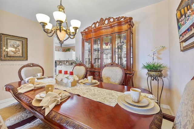 dining room featuring a chandelier
