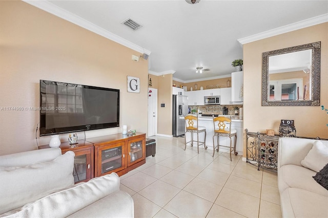 tiled living room with crown molding