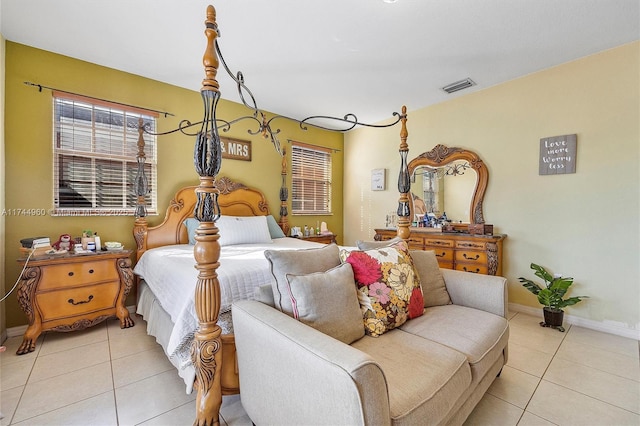 bedroom featuring light tile patterned floors