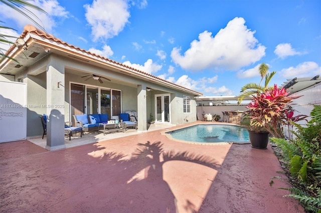 view of swimming pool with french doors, ceiling fan, an outdoor hangout area, and a patio