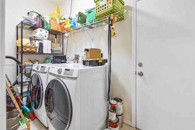 laundry room with washing machine and dryer