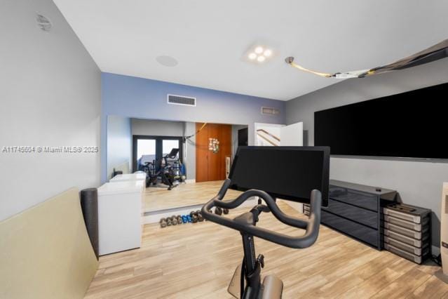 10655 NE Quaybridge Ct Unit C3, Miami, FL 33138 - workout room with wood finished floors and french doors