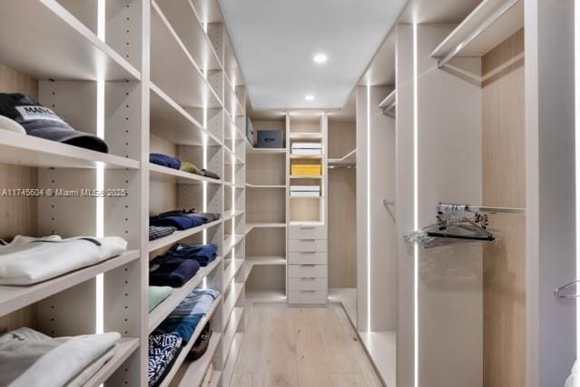 10655 NE Quaybridge Ct Unit C3, Miami, FL 33138 - walk in closet featuring wood finished floors