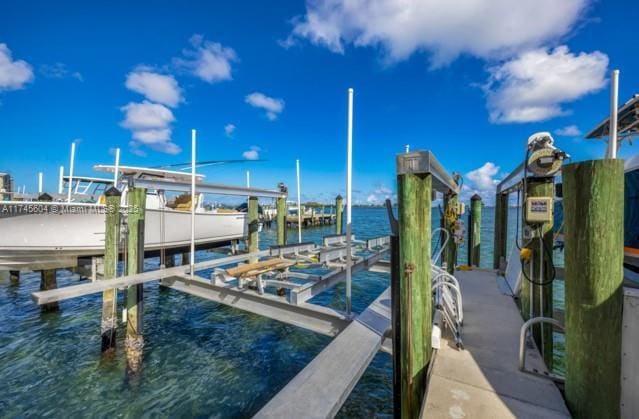 10655 NE Quaybridge Ct Unit C3, Miami, FL 33138 - dock area with a water view and boat lift