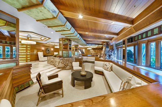 10655 NE Quaybridge Ct Unit C3, Miami, FL 33138 - building lobby featuring a wood ceiling with exposed beams