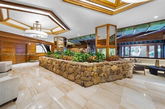 10655 NE Quaybridge Ct Unit C3, Miami, FL 33138 - community lobby featuring wooden walls and ornamental molding