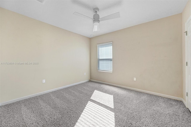 unfurnished room featuring carpet flooring and ceiling fan