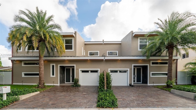 view of front of property featuring a garage