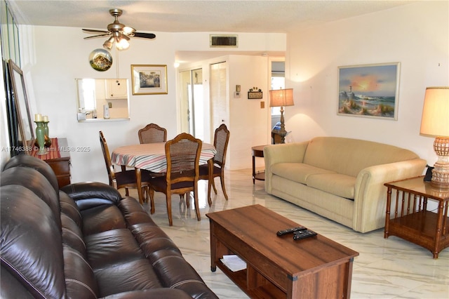 living room with ceiling fan