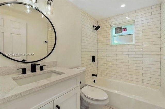 full bath featuring toilet, vanity, and bathtub / shower combination