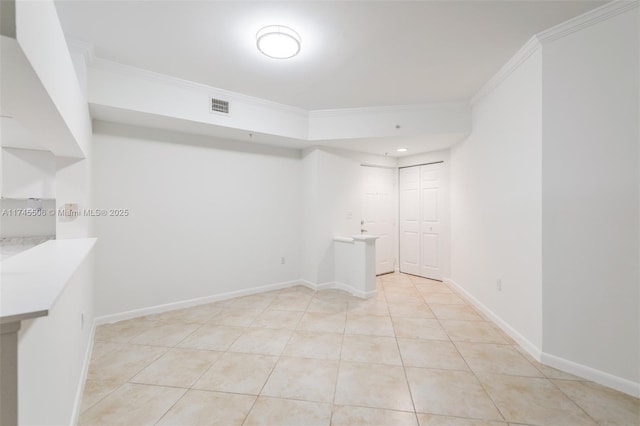 17100 N Bay Rd Unit 1303, Sunny Isles Beach, FL 33160 - empty room featuring ornamental molding and light tile patterned floors