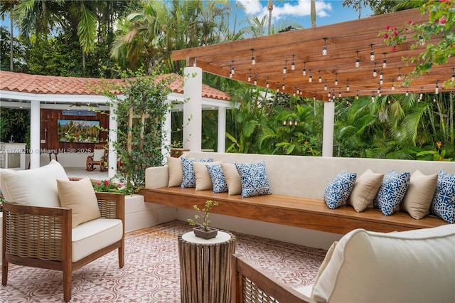 exterior space with outdoor lounge area and a pergola